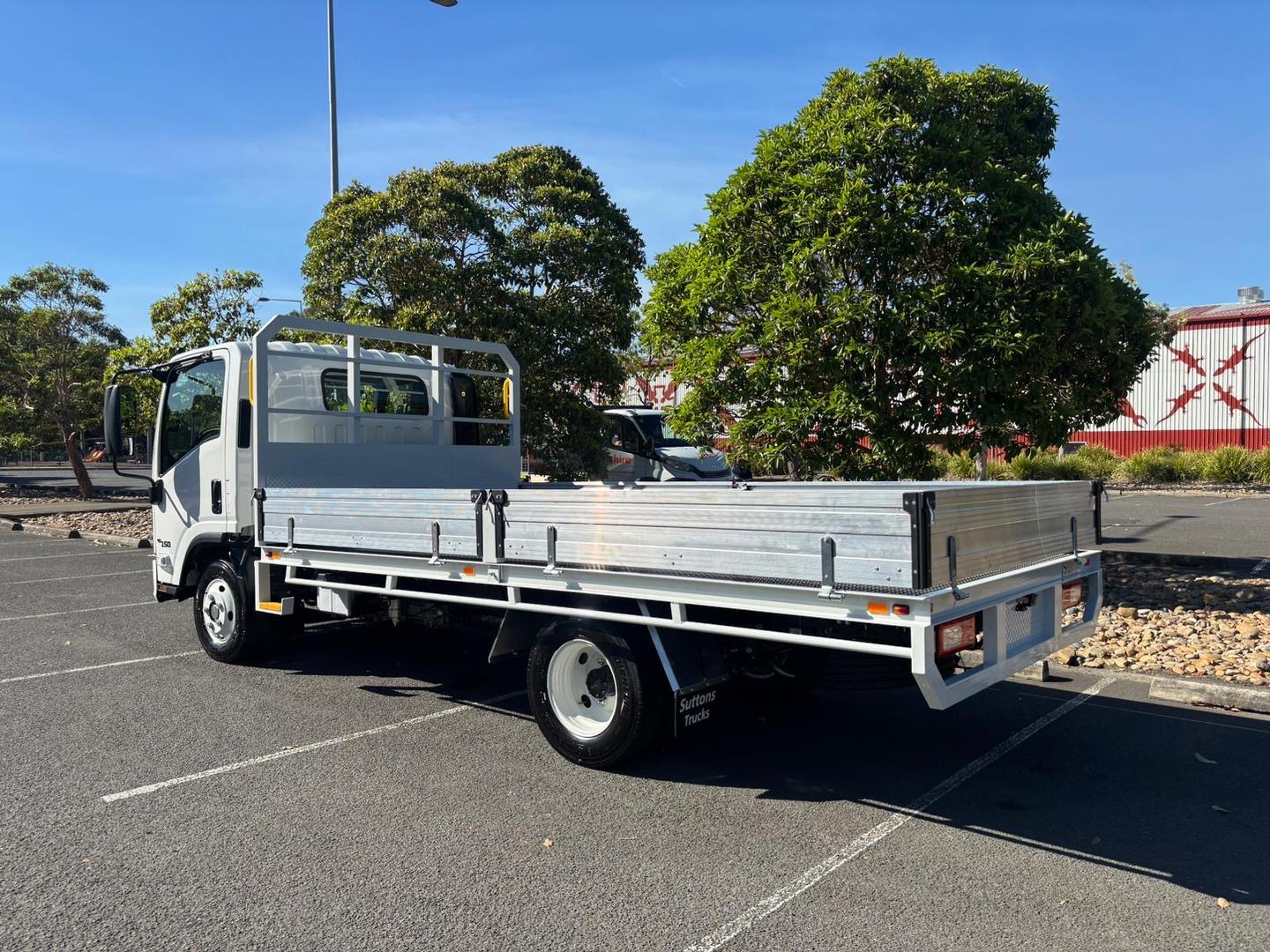 2025 Isuzu N Series NNR 45-150 DT D34 Steel Tray with Aluminium Dropsides image 2