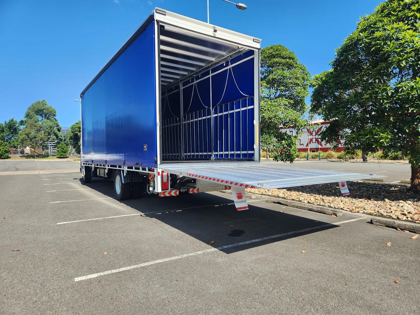 2026 Isuzu F Series FSD 140/120-240 AM R56 New Age 12 Pallet Tautliner with Tailgate image 11